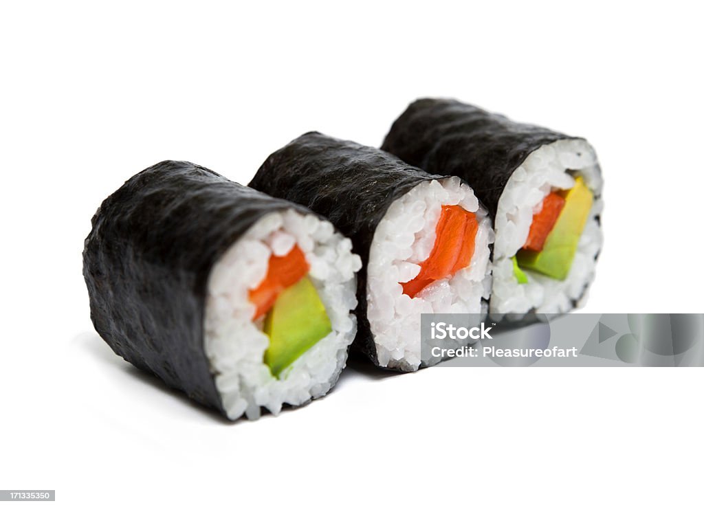 Tre involtini di sushi - Foto stock royalty-free di Sushi