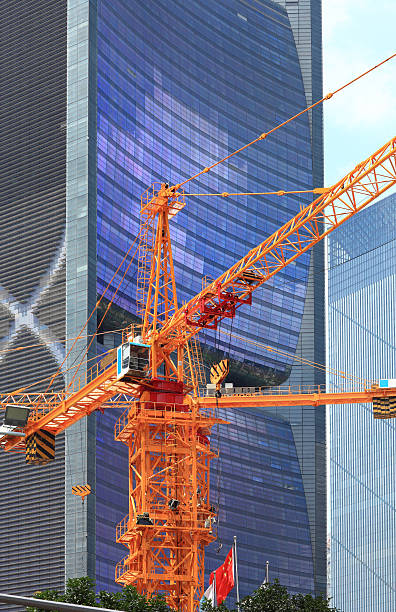 istock Skyscrapers and construction site in guangzhou 171335409