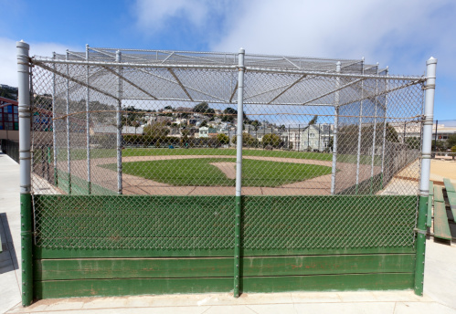 Neighborhood baseball field and backstop. Horizontal.