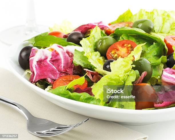 Salad With Olives Tomato And Chicory Stock Photo - Download Image Now - Appetizer, Close-up, Crockery