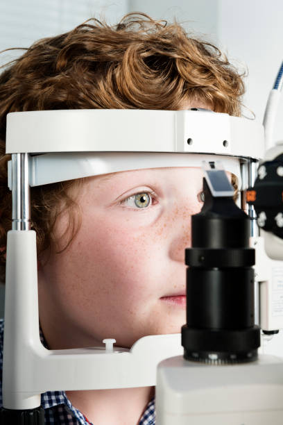istock Young Boy Having His Eyesight Checked at The Opticians 171336311