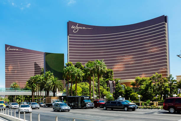Wynn Hotel and Casino on the Las Vegas Strip "Las Vegas, USA - September 4, 2012: Wynn and Encore luxury resort and casino on the Las Vegas Strip as seen from across Las Vegas Blvd. during the day." wynn las vegas stock pictures, royalty-free photos & images