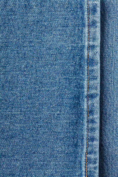 Close up shot of blue denim jeans, lots of nice stitching detail and texture in this shot, Plenty of copy space.