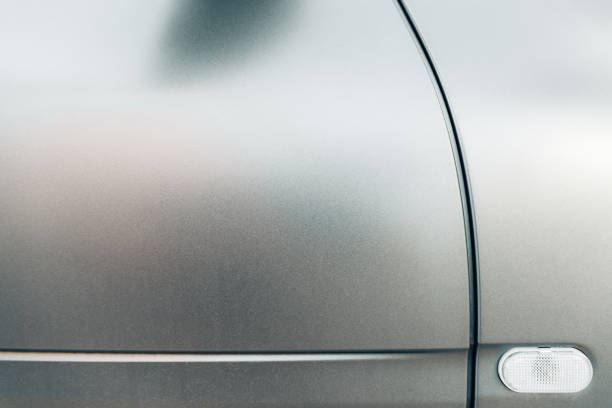 istock Modern lines in a metallic chassis design of car doors with matte paint. 1713365906