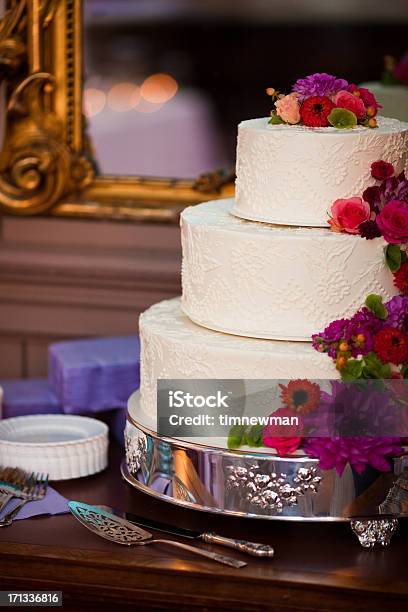 Elegant White Wedding Cake And Floral Arrangement Close Up Detail Stock Photo - Download Image Now