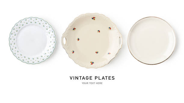 istock Empty vintage plate set isolated on white background 1713368757