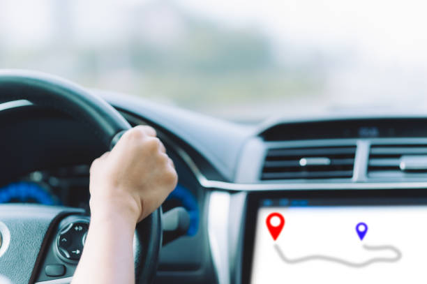 istock female hands, holding a steering wheel, car, driving a delivery truck, using a navigation device, through an online app, pinning goals, practicing driving. 1713369936