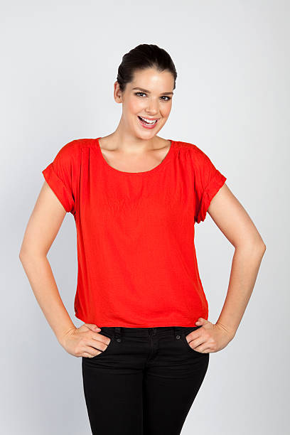 istock Friendly young woman posing on grey background 171337042