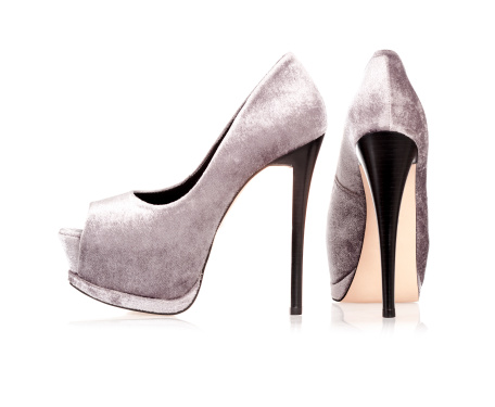 Fashionable  High Heels shoe with extrem platform in grey/silver colour. Latest style for fall / winter 2013. Isolated on white.See more fall/winter 2013 models and other high heels:
