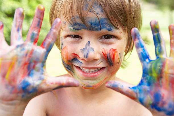 istock Portrait Of Boy With Painted Face And Hands 171337391