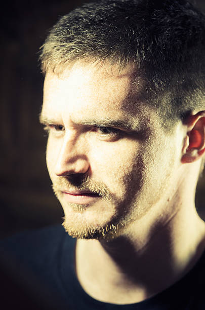 istock Dark serious male portrait 171337637