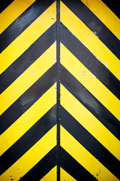 istock Black and Yellow Stripes Chevron Hazard Background 171338931