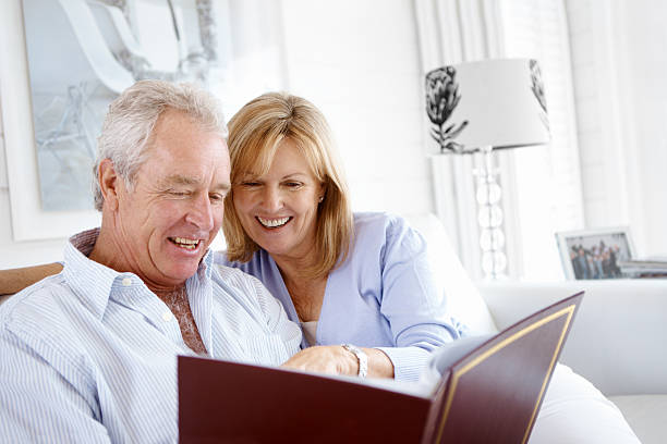 istock Looking at a photo album together 171339224
