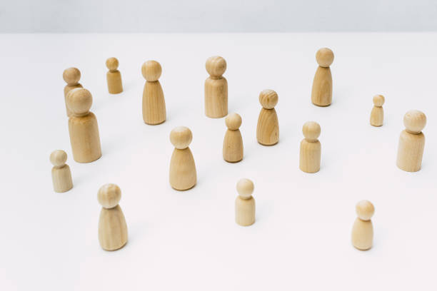 istock Figures in solitude isolated from other people, minimalist, seen from above. 1713396865
