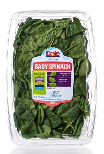 Dole All Natural Baby Spinach Salad package "Miami, USA - July 22, 2012: Dole All Natural Baby Spinach Salad 11 OZ package. Dole brand is owned by Dole Food Company, Inc." dole stock pictures, royalty-free photos & images