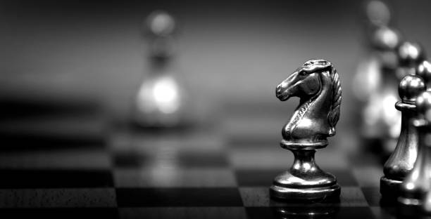 istock Chess Pieces on Board for Game and Strategy 1713406296