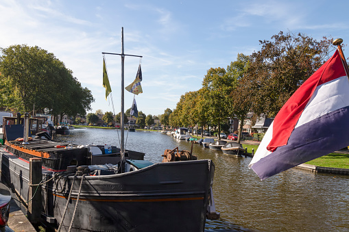 Boats in the harbor of the Dutch city of Woerden.