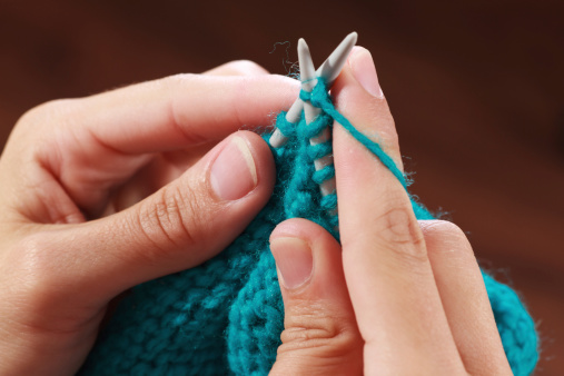 Woman's Hands Knitting Close-up