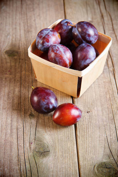 istock Plums In A Wood Pint Box 171340909