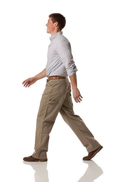 istock Profile of a happy man walking 171341299