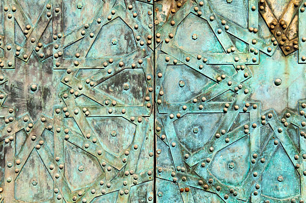 Arab design on centuries-old bronze door in Aleppo, Syria