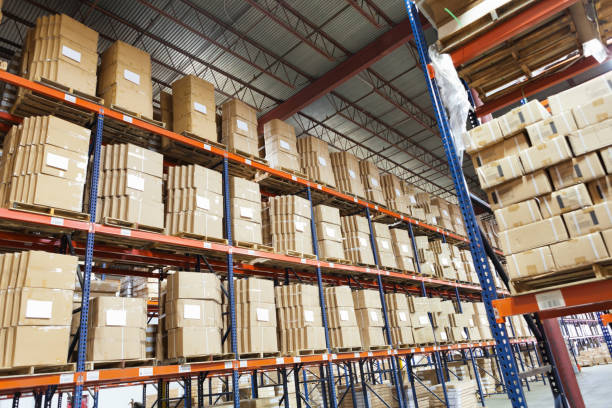 istock Shelves lined with boxes in shipping distribution factory and warehouse 171341520