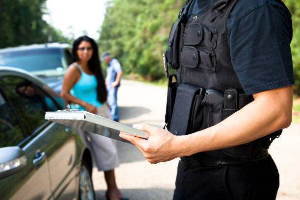 istock Policemen and woman during traffic stop 171341987