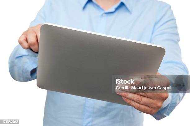 Businessman Using Digital Tablet Pc Seen From The Back Stock Photo - Download Image Now
