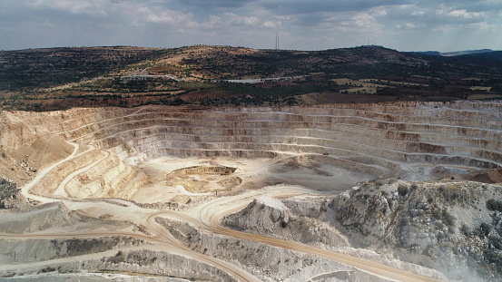 Rock crusher and conveyor belt at the plant of a copper mine in the altiplano of the Atacama Desert in northern Chile.