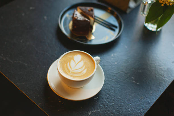 istock Cup of coffee on the table. Chocolate dessert 1713434671