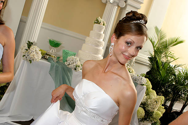 istock Funny Stylish Face Making Bride at Wedding Reception in Dress 171343601