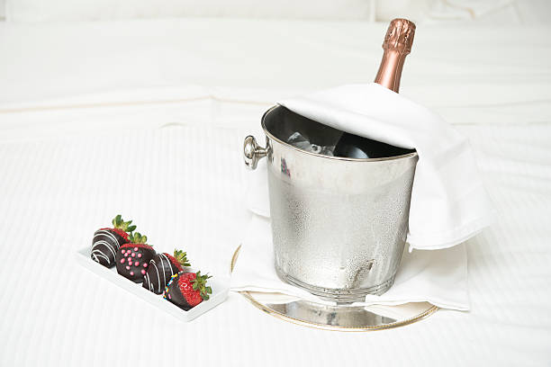 Champagne and Strawberries "champagne, strawberries / which are dipped in choc-o-late / a lovely surprise" chocolate covered strawberries stock pictures, royalty-free photos & images
