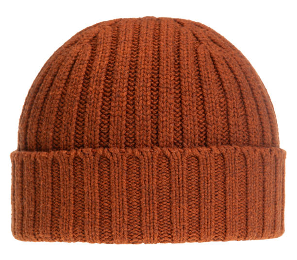 istock Red knit winter bobble hat isolated on white 1713447211