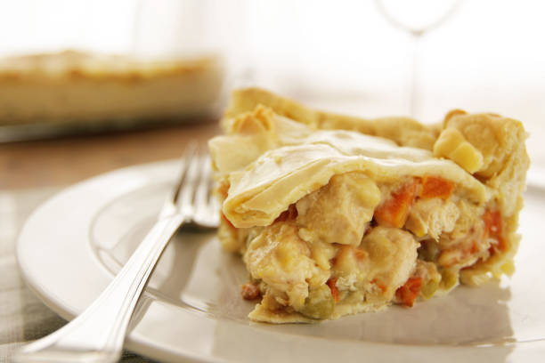 Homemade chicken pot pie filled with chicken and vegetables stock photo