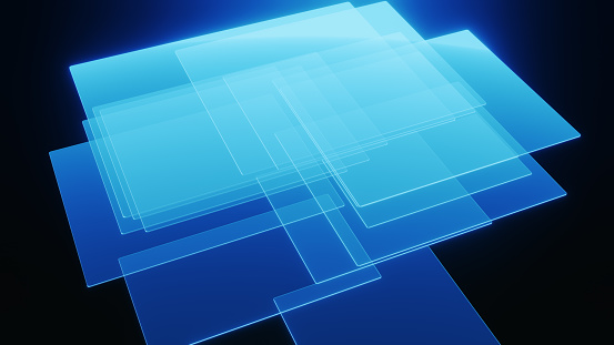 CGI: group of layered holographic screens floating mid-air in blue light.
