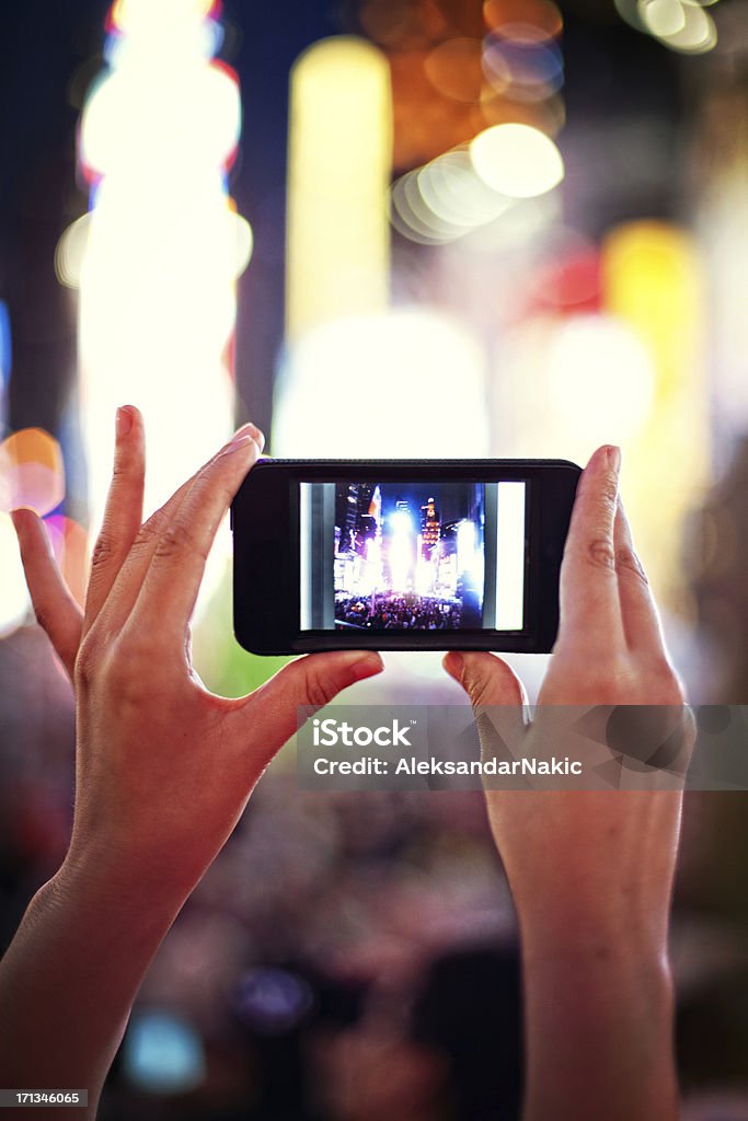 Photographing Times Square Photographing Times Square  Adult Stock Photo