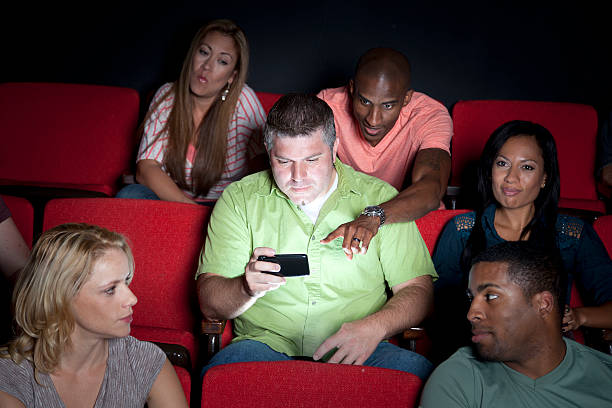 istock Texting at the Movies 171346165