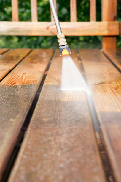 istock Pressure Washer Cleaning a Weathered Deck 171346510