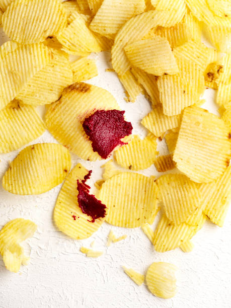 Red beet dip with potato chips. Beet dipping Sauce. Beet dipping sauce and nacho Chip