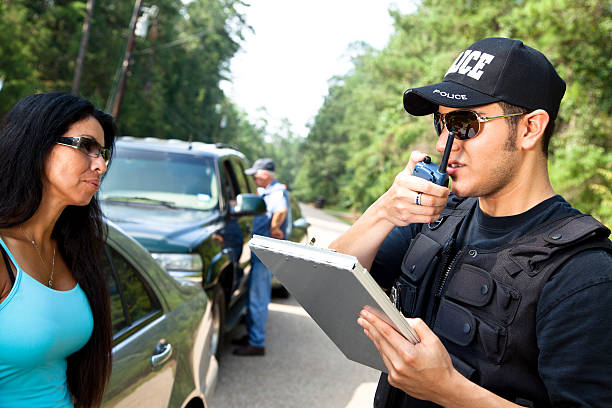 istock Policemen and woman during traffic stop 171347830