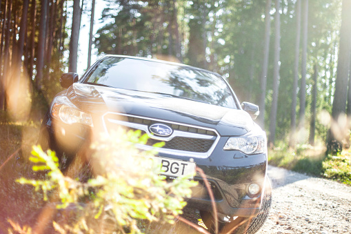 Bicester,Oxon,UK - Oct 9th 2022. 2003 Subaru Impreza classic car driving on an English country road