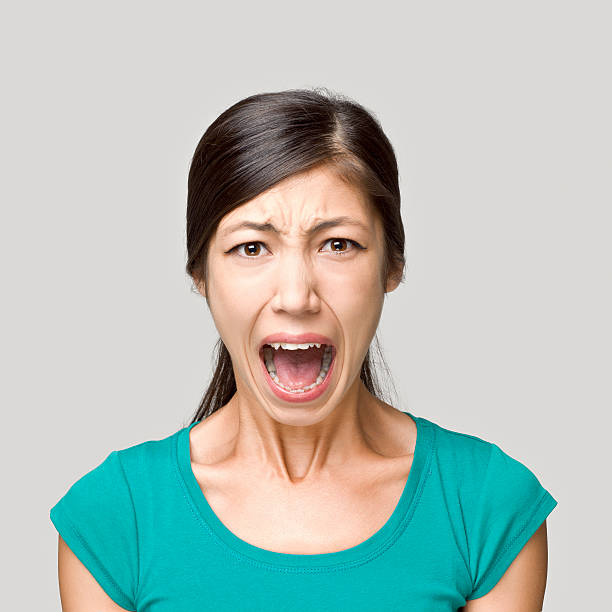istock Young woman shouting to the camera 171348210