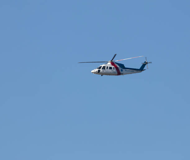 Rega rescue helicopter type Leonardo AW109SP GrandNew HB-ZRK up in the sky at Swiss airport Zürich Kloten on a sunny summer noon. Photo taken July 30th, 2024, Zurich, Switzerland.