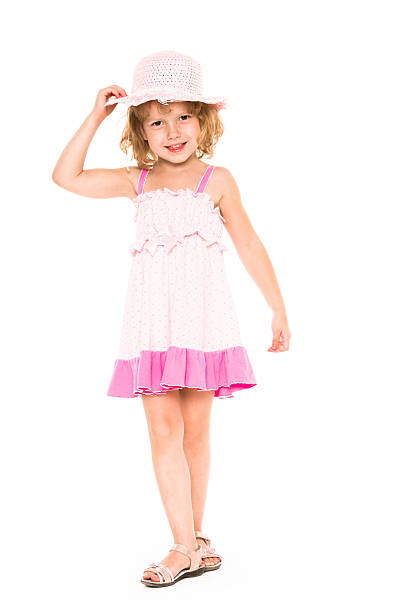 Little four year old girl happy. white background.