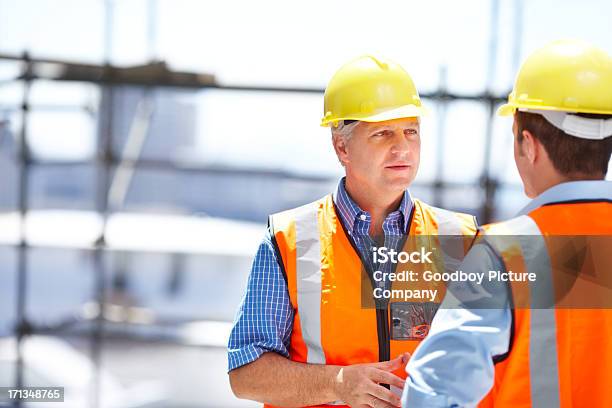 Making Sure That We Are Both On The Same Page Stock Photo - Download Image Now - Adult, Adults Only, Architect