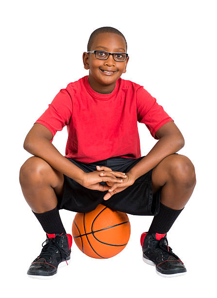 istock Boy Sitting on His Basketball 171348791