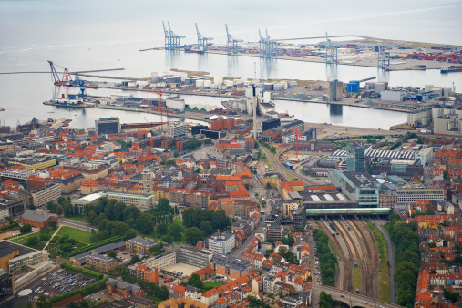 City from above with industry, trainstation and harbor