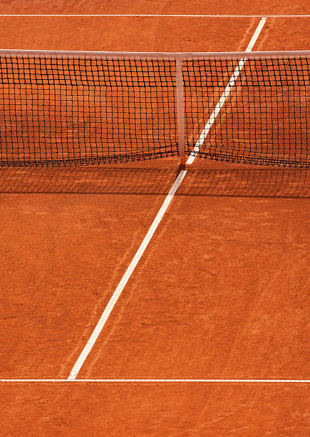 Clay tennis court Clay tennis court. The French open Roland garros clay court. Grand Slam tennis tournament stock pictures, royalty-free photos & images