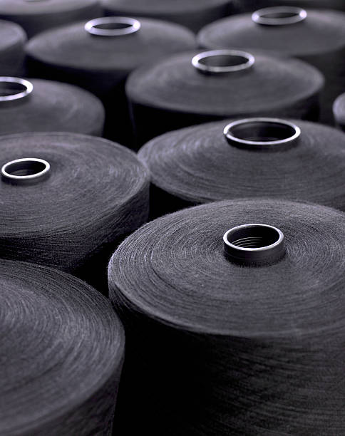 fábrica textil (haga clic para obtener más información) - embroidery spool thread sewing fotografías e imágenes de stock