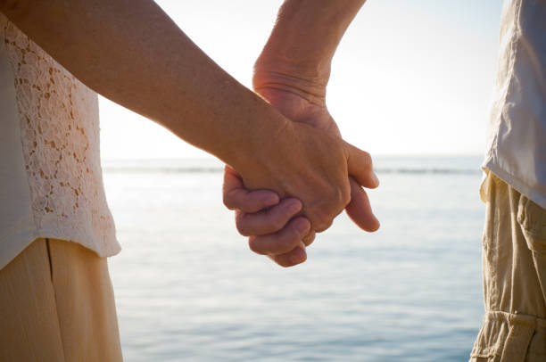 istock Senior couple holding hands 171350870